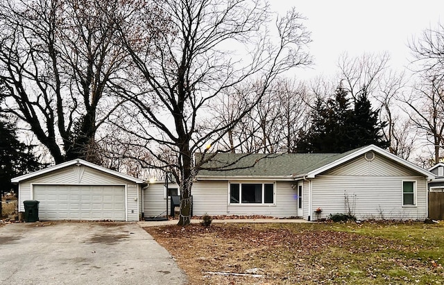 single story home featuring a garage