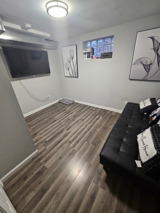 living room featuring dark wood-type flooring