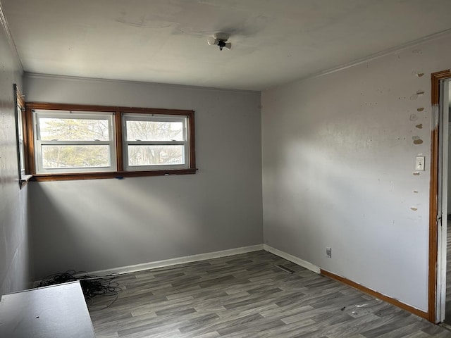 spare room with light hardwood / wood-style flooring