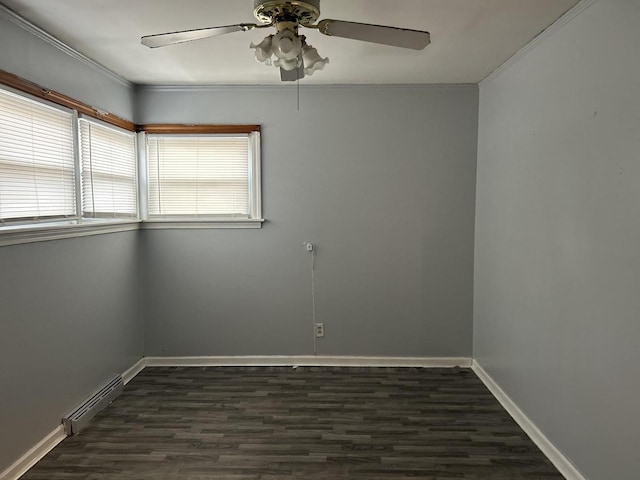 unfurnished room featuring ceiling fan, a baseboard heating unit, dark hardwood / wood-style flooring, and crown molding