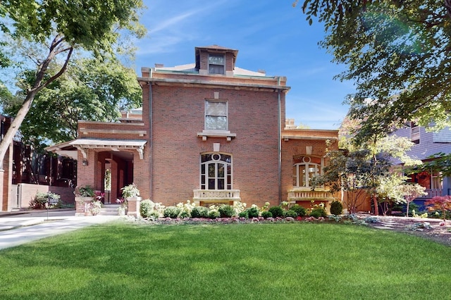 italianate-style house with a front lawn and brick siding