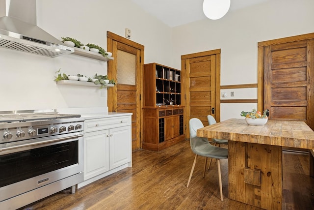 5235 S University Ave, Chicago, IL 60615 - kitchen with wall chimney exhaust hood, high end stainless steel range oven, dark wood-style flooring, open shelves, and white cabinetry