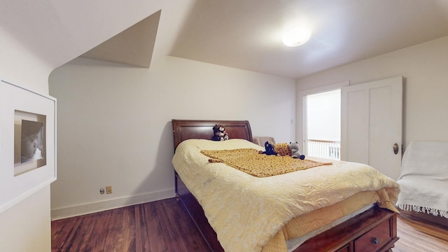 bedroom with wood-type flooring