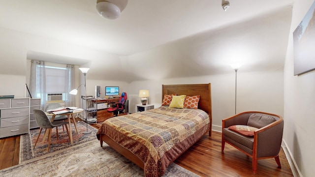 5235 S University Ave, Chicago, IL 60615 - bedroom featuring wood finished floors, an office area, cooling unit, and baseboards