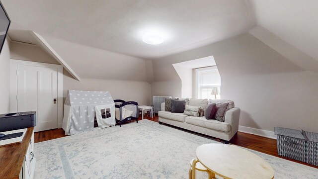 5235 S University Ave, Chicago, IL 60615 - bedroom featuring lofted ceiling, dark wood-style flooring, and baseboards