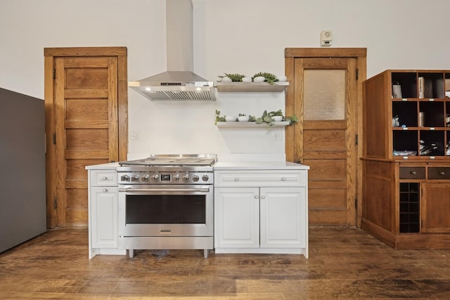 5235 S University Ave, Chicago, IL 60615 - kitchen featuring appliances with stainless steel finishes, wall chimney range hood, white cabinetry, dark wood-style flooring, and open shelves
