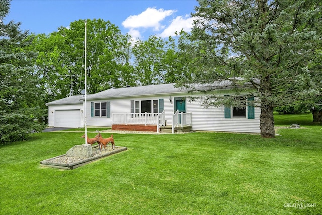 exterior space featuring a front lawn and a garage