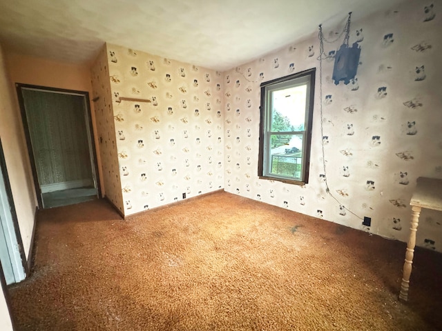 unfurnished bedroom featuring carpet