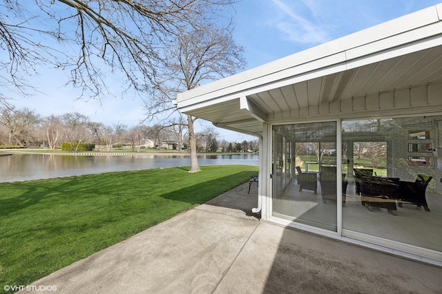 view of patio / terrace with a water view