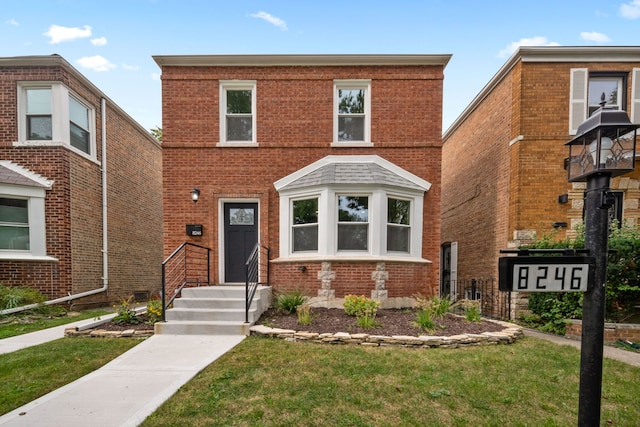 view of front of home featuring a front yard