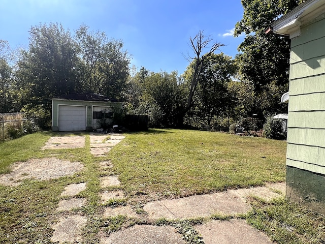 view of yard featuring a garage