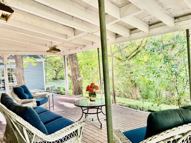 wooden deck with ceiling fan