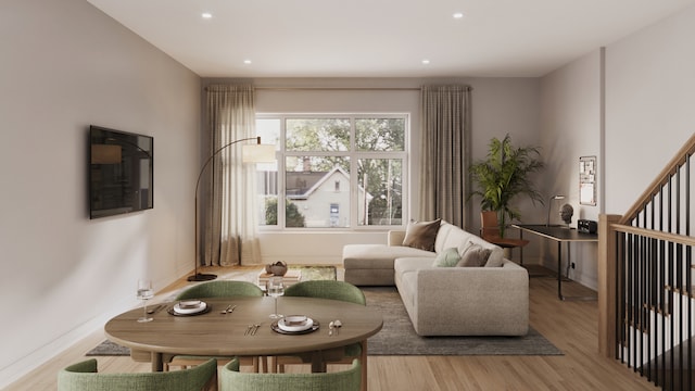 living room with light hardwood / wood-style floors