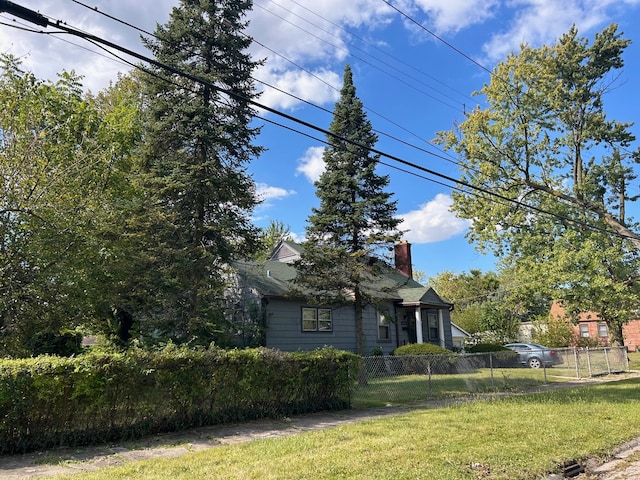 exterior space with a front lawn