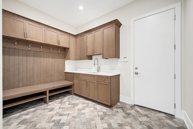 mudroom featuring sink