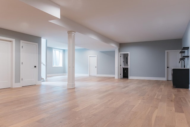 unfurnished living room with light wood-type flooring