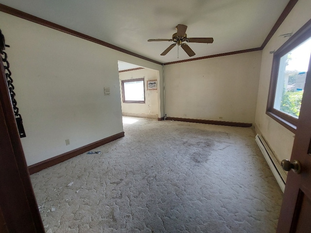 empty room featuring a baseboard radiator, light carpet, a wall mounted air conditioner, ornamental molding, and ceiling fan