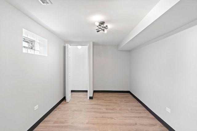 basement featuring light hardwood / wood-style floors