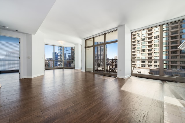 interior space featuring hardwood / wood-style flooring and floor to ceiling windows