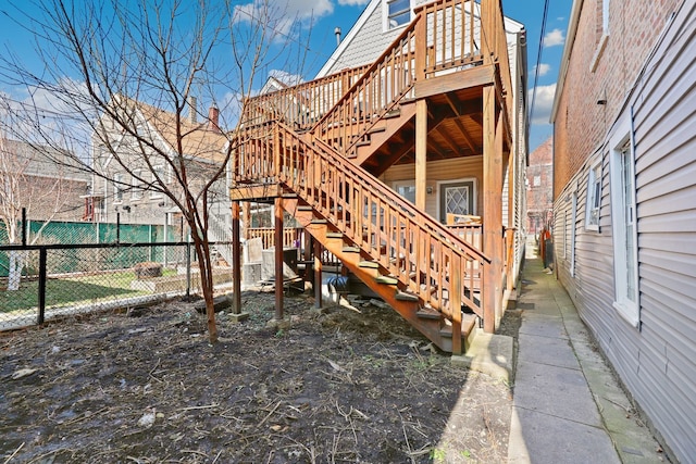 back of property featuring a deck