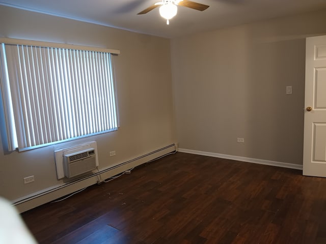 unfurnished room with ceiling fan, dark wood-type flooring, a wall mounted AC, and a baseboard heating unit