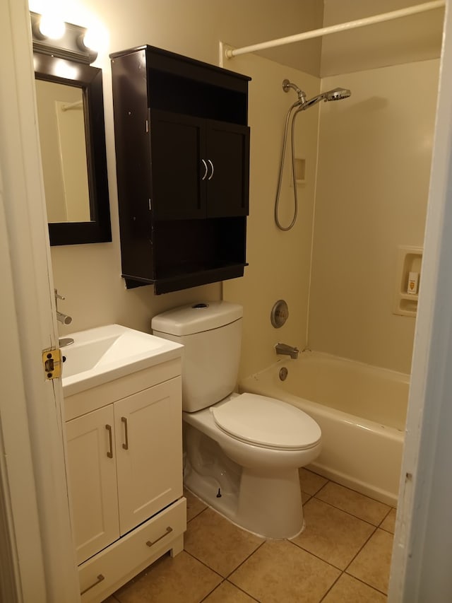 full bathroom featuring toilet, bathtub / shower combination, vanity, and tile patterned floors