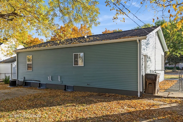 view of property exterior with central AC unit