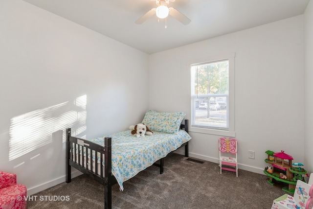 carpeted bedroom with ceiling fan