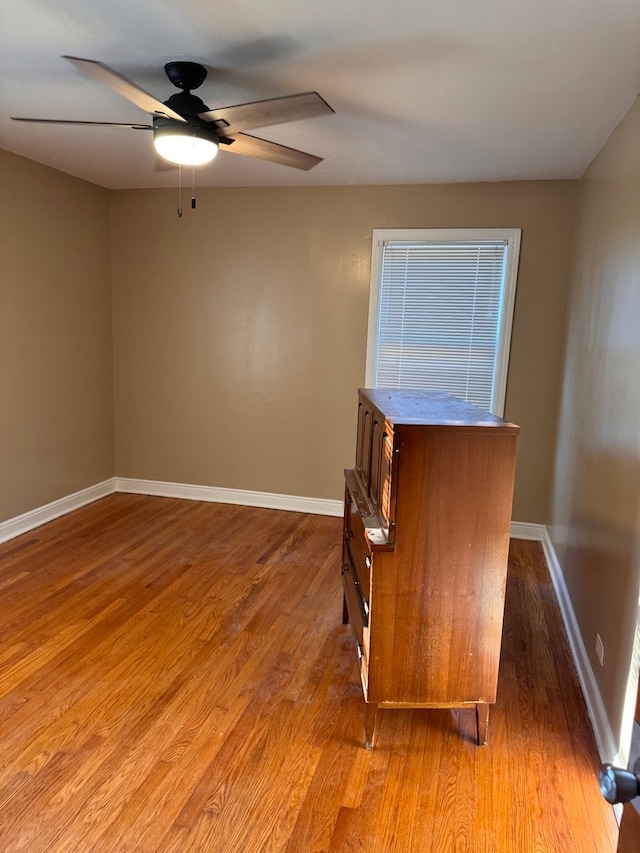 empty room featuring light hardwood / wood-style flooring and ceiling fan