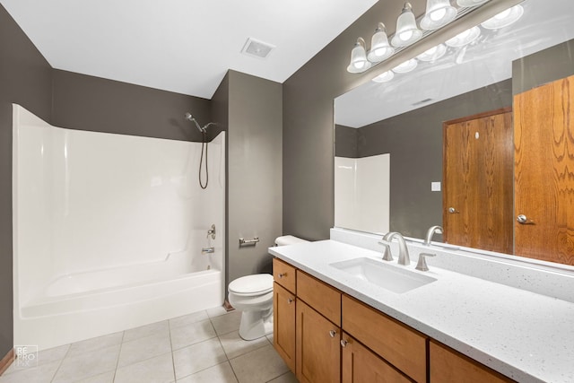 full bathroom featuring shower / tub combination, vanity, toilet, and tile patterned floors