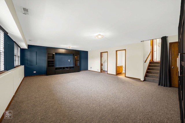 basement with carpet flooring