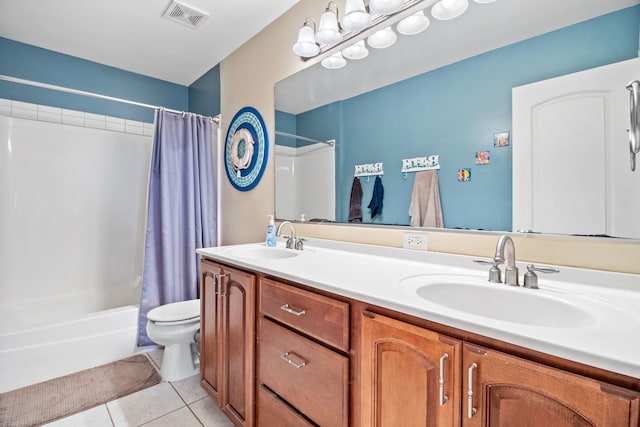 full bathroom with shower / bath combination with curtain, vanity, tile patterned flooring, and toilet