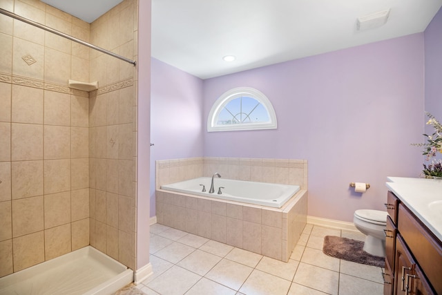 full bathroom featuring tile patterned flooring, shower with separate bathtub, vanity, and toilet