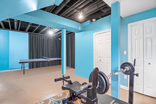 exercise room with concrete flooring