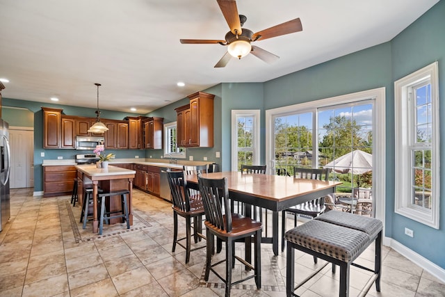 dining room with ceiling fan