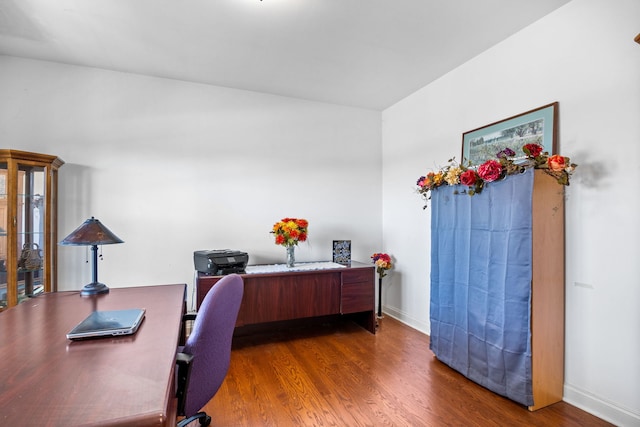 office area with dark hardwood / wood-style flooring