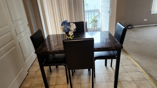 view of carpeted dining room