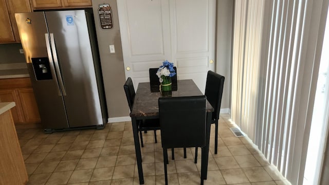 view of tiled dining area