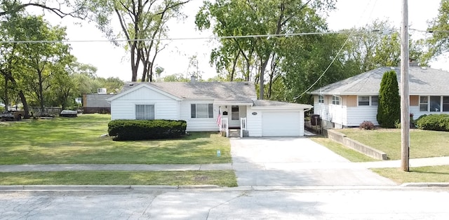 ranch-style house with a garage and a front lawn