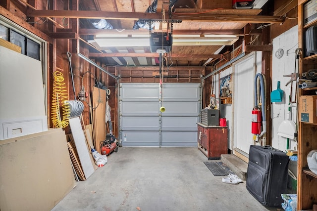 garage featuring a garage door opener