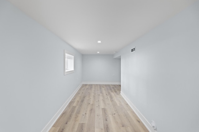 basement with light wood-type flooring