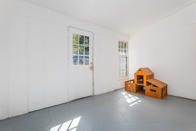 interior space featuring vaulted ceiling