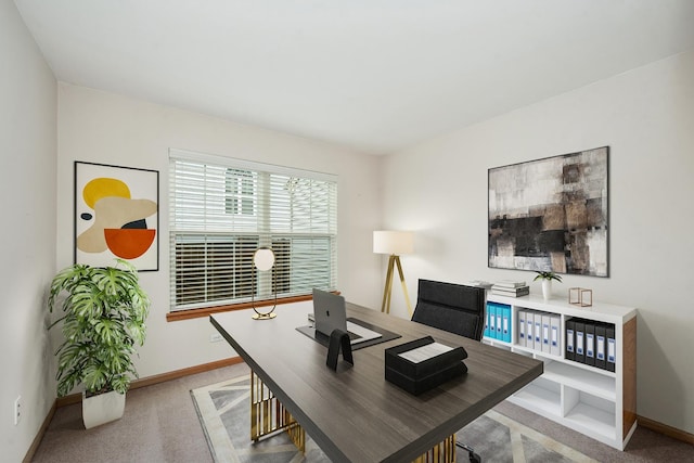 office area featuring light colored carpet