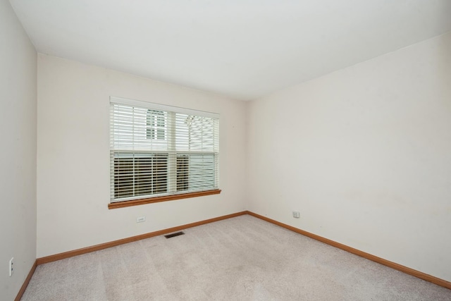 unfurnished room with carpet