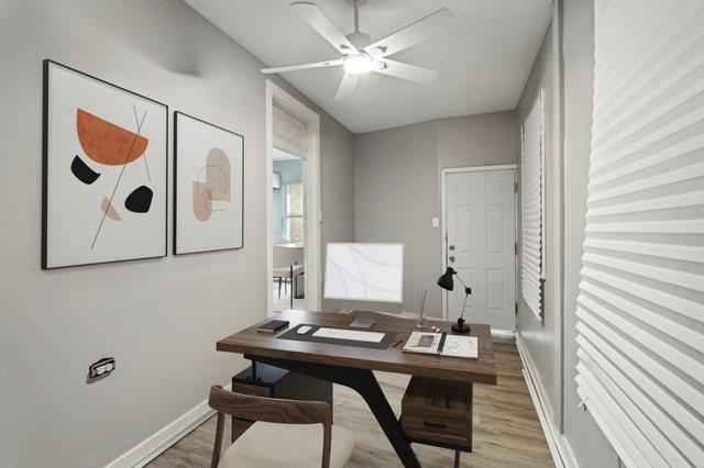 office featuring ceiling fan and wood-type flooring