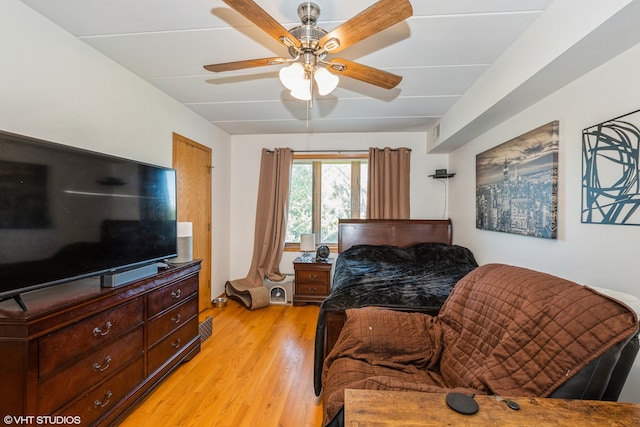 bedroom with ceiling fan and light wood-type flooring