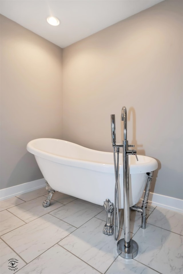 bathroom featuring a tub to relax in