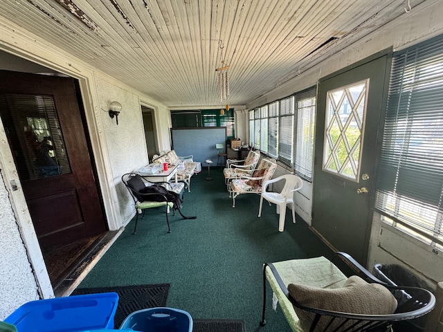 sunroom with wooden ceiling