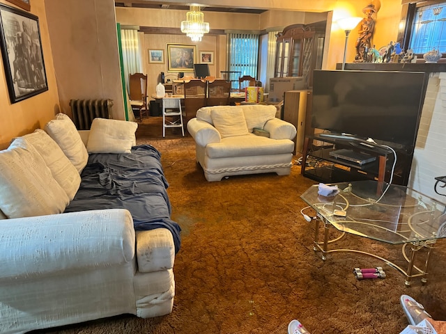 carpeted living room with an inviting chandelier and radiator