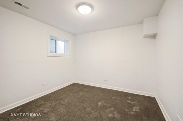 unfurnished room featuring carpet floors